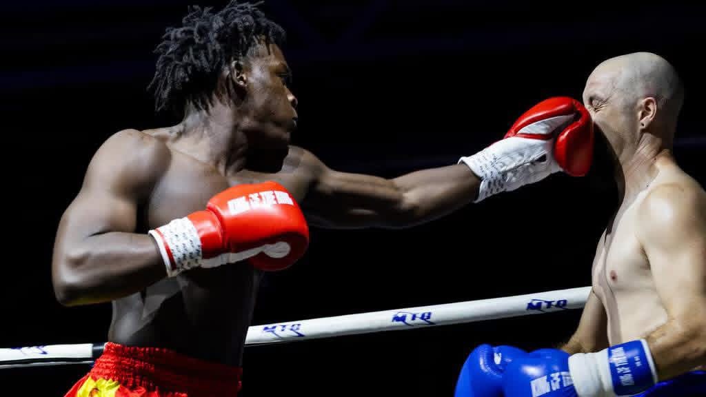 Boxer snapping out a straight right hand
